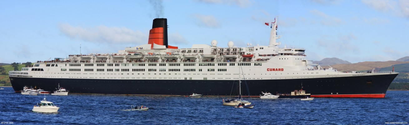 QE2 at Greenock, October 2008
The QE2 makes its last visit to its birthplace, the River Clyde.  Launched in 1967 it was designed for high speed transatlantic crossings at a service speed of 28.5 knots.  She originally had two steam turbines but these replaced in 1986 with diesel engines and at the same time some of the upper cabins with balconies were added.  The most obvious outward change was the funnel which lost its tall slender look.
