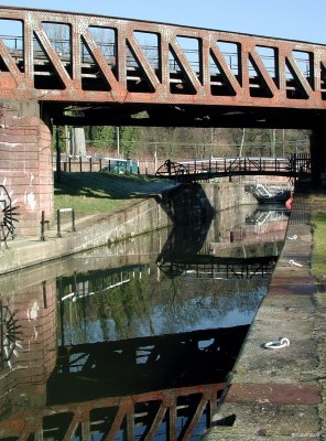 Reflections, Forth & Clyde canal, Bowling
The point at which the Forth and Clyde Canal leaves the Bowling Basin and heads East.  [url=http://www.streetmap.co.uk/map.srf?X=245107&Y=673544&A=Y&Z=115/] Map location. [/url]
