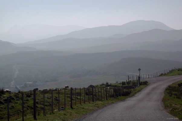 View on road to Shieldaig
This picture was taken on an unusually warm mid September day when heat haze makes 
the distant hill appear as shades of pastel.
