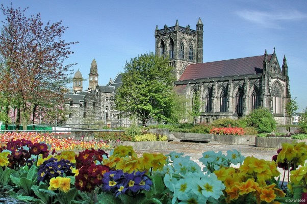 Spring colours at Paisley Abbey
Since this photo was taken in 2001 this area has gone, it was the roof of the underground carpark at the council headquarters. 
