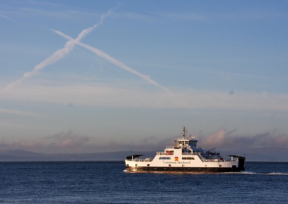 M.V. Loch Shira, Largs
Loch Shira heads out to the Cumbrae from Largs with what looks like a St Andrew flag painted in the sky by condensation trails.
