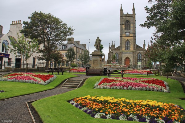 St John's Square, Thurso, 2019
In these days of cutbacks there are few places you return to 10 years later and find its as good as it was the first time.  This public space in the centre of Thurso never fails to disappoint with its summer colour.  [url=http://streetmap.co.uk/map?X=311622&Y=968293&A=Y&Z=106/] Map location. [/url]

