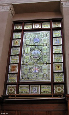Stained glass window, Greenock District Court
The names around the panels in this window are a reminder that Greenock used to be an administrative centre in the old county of Renfrewshire.  Barrhead and Neilston both get a mention.  
