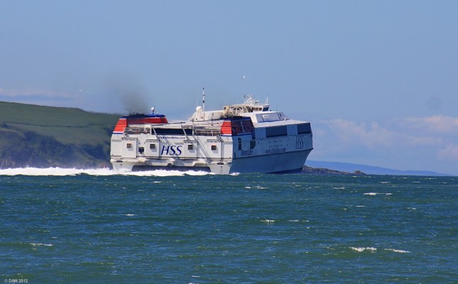 HSS Stena Voyager, Loch Ryan
Built in 1996 for the Belfast to Stranraer crossing at high speed, she can carry 1500 passengers and 375 cars at up to 40 knts.  She is seen here as she nears the end of Loch Ryan and the power from the 4 GE gas turbines that powers the water jets is increased.  Since this photo was taken in 2010 her future is uncertain, the new ferry terminal at Cairnryan doesn't have the required linkspan so the ship is currently out of service.
