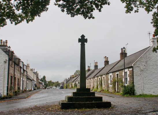 Main Street, Straiton, South Ayrshire
A view of the main street from behind the war memorial.  Straiton dates from 1760 when the village was laid out by Thomas, Earl of Cassillis. [url=http://www.streetmap.co.uk/map.srf?X=238268&Y=604824&A=Y&Z=115/] Map location. [/url]

