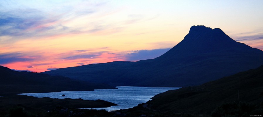 Sunset over Stac Pollaidh
The familiar out line of Stac Pollaidh just after sunet.  [url=http://www.streetmap.co.uk/map.srf?X=213745&Y=906917&A=Y&Z=120/] Map location. [/url]
