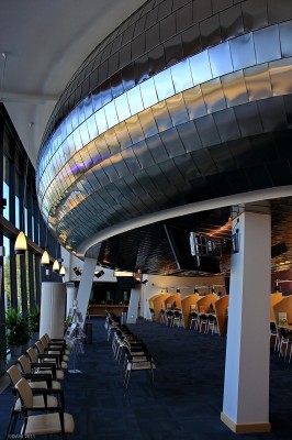 Take me to your leader, Paisley
In this case the leader would be your local 'cooncillor'  Looking a bit like something from a Sci-fi film set this is the Customer service centre of Renfrew District Council offices in Paisley.  The elliptical council Chamber is suspended above on the pillars.  [url=http://www.streetmap.co.uk/map.srf?X=248673&Y=663892&A=Y&Z=115/] Map location. [/url]
