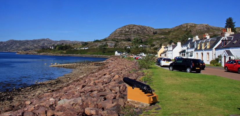 The Carronade Gun, Shieldaig
In the 1800's herring smacks sailing from Shieldaig often had a gun fitted. Local legend says that this gun belonged to a fisherman by the name of George Leid, he had fallen out with local Minister, Donald McDonald, about keeping the Sabbath.  One Sunday on returning from fishing he fired the gun at Shieldaig Island only for it to malfunction and blow off his arm.  The muzzle of the gun is still missing.
