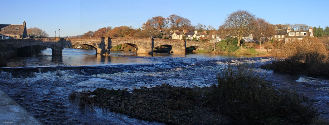 The Cree Bridge, Newton Stewart
Winter sun on the bridge over the River Cree which flows through Newton Stewart. [url=http://www.streetmap.co.uk/map?X=240201&Y=565846&A=Y&Z=120&ax=241126&ay=565591/] Map location. [/url]
