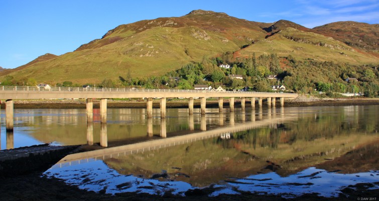 The Dornie Bridge
This bridge was built in 1991 but replaced an earlier one dating from the 1940's.  The earlier bridge replaced a ferry and had an opening span in the centre to allow boats to enter Loch Long. [url=http://streetmap.co.uk/map.srf?X=187913&Y=826253&A=Y&Z=120/] Map location. [/url]
