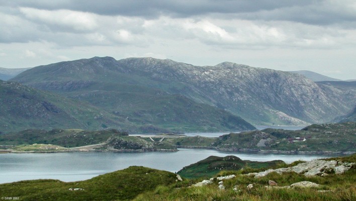 Over looking Loch a Chairn Bhain towards the Kylesku Bridge
Beinn a Bhutha rises to 547m behind the Kylesku Bridge . [url=http://www.multimap.com/map/browse.cgi?lat=58.2495&lon=-5.089&scale=25000&icon=x/]Map location[/url]
