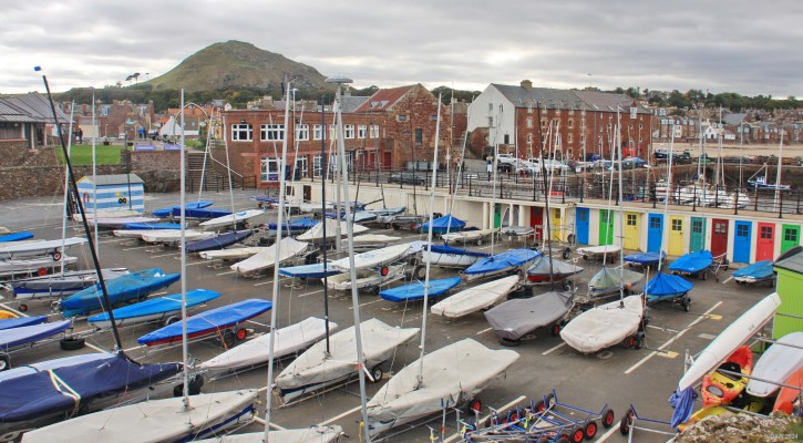 Location of former outdoor swimminbg pool, North Berwick
Where all the boats are sitting was, until 1996, an outdoor swimming pool.  The coloured doors were the changing rooms.  The pool was built around 1900 and there is a group in North Berwick that would like to see the return of the pool. [url=http://streetmap.co.uk/map?X=355407&Y=685689&A=Y&Z=115/] Map location. [/url]
