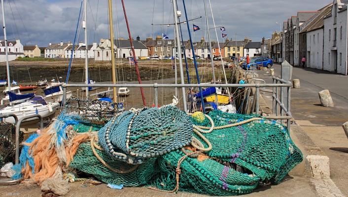 The Harbour, Isle of Whithorn
Overlooking the harbour at the small village of Isle of Whithorn.  With a population of only 300 a sunny day can bring nearly as many visitors.  [url=http://www.streetmap.co.uk/map.srf?X=247690&Y=536147&A=Y&Z=115&ax=247775&ay=536262/] Map location. [/url]
