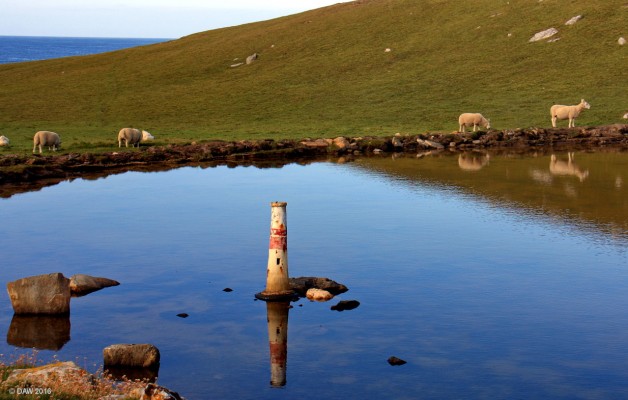 The other lighthouse at Strathy Point, Sutherland
The slightly smaller lighthouse in Lochan nam Faoileag just behind the official one.  [url=http://streetmap.co.uk/map.srf?X=282830&Y=969499&A=Y&Z=115/] Map location. [/url]
