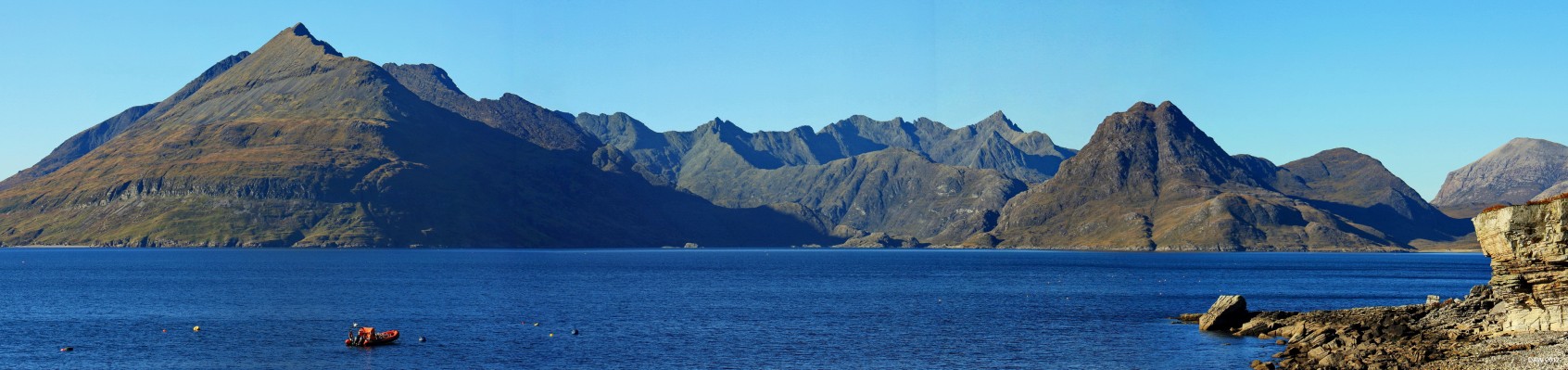 The Cuillins from Elgol, Skye
Said to be the most spectacular view in the British Isles and I won't argue with that.  You don't often see it like this, I've been several times over the last 30 years and this was only time its been so clear.  On the extreme right is Bla Bheinn at 928m, the closer volcano shaped hill is Sgurr na Stri at 497m and on the left is Gars Bheinn at 895m.
