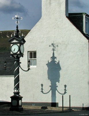 Ullapool Village Clock
The Fowler Memorial Clock in Ullapool was erected in 1899 in memory of the sons and grandsons of Sir John Fowler of Braemore who were killed in action.  The clock used the original clockwork mechanism until 1995 when money was raised to convert it to run on electricity and save the need for winding it.
