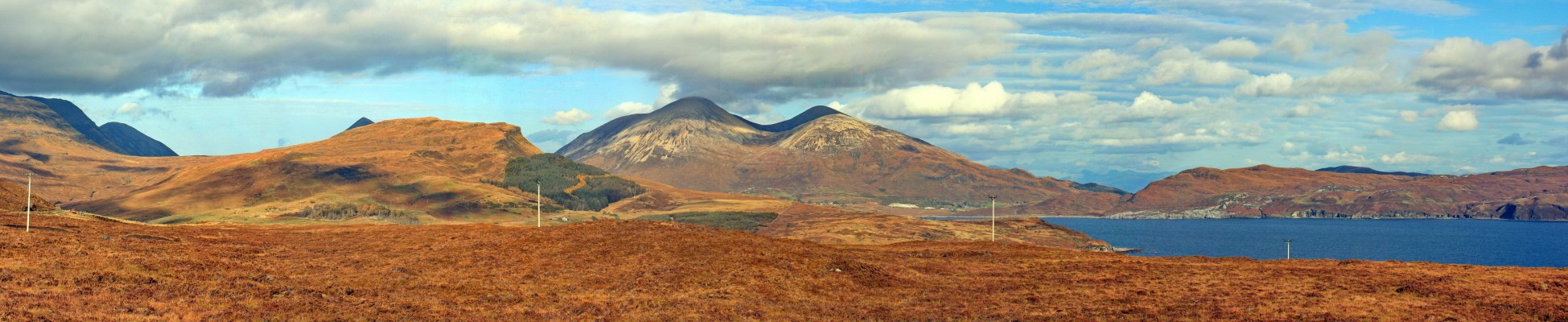 Panoramic view from Loch Slappin, Isle of Skye
The hills in the centre of the picture are Beinn Dearg Mhor (709m) and Beinn na Caillich (732m), Loch Slappin is on the right.  [url=http://streetmap.co.uk/map.srf?X=154327&Y=815517&A=Y&Z=120/] Map location. [/url]
