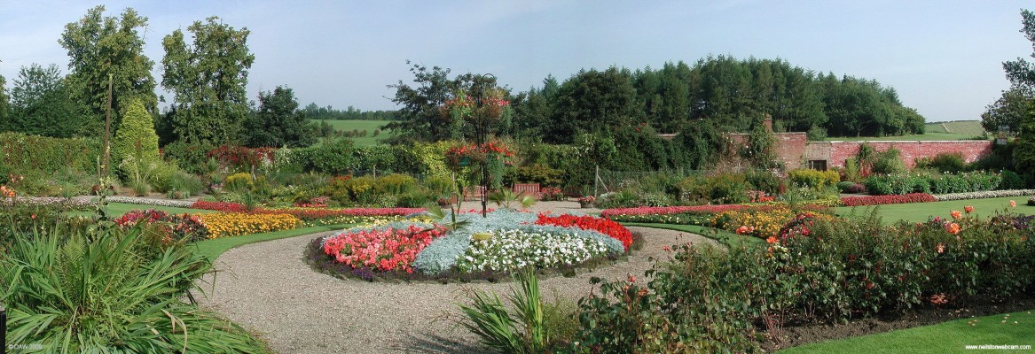 The Walled Garden, Barshaw Park, Paisley
Hidden away at the very back of Barshaw Park is this beautifully kept walled garden.  Barshaw Park was opened in 1912 by Paisley Burgh Council after they bought the land from the Arthur family in 1911.  Barshaw Golf course can be seen in background. [url=http://www.streetmap.co.uk/map.srf?X=250362&Y=664334&A=Y&Z=115/] Map location. [/url]
