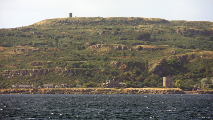 The Wee Cumbrae from Hunterston
A distant view of the Wee Cumbrae from Hunterston.  On the shore you can see Cumbrae House and on the right Cumbrae Castle.  The tower on the top was the original Lighthouse.  [url=http://streetmap.co.uk/map.srf?X=217716&Y=650580&A=Y&Z=120/] Map location. [/url]
