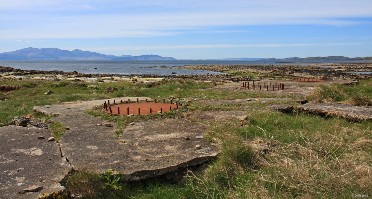 Z battery, South Inch, Seamill
Z Batteries were a form of anti-aircraft rocket used mostly by the Home Guard in WWII.  The system was known as an Unrotating Projectile and launched small mines on a parachutes with trailing wires that hopefully would tangle with enemy Aircraft.  Various sites around the Clyde had them but it is thought this location might have been for training.  During the war the nearby harbour at Ardrossan was taken over by the Admiralty and known as HMS Fortitude.  All that remains are the steel mounting plates.
