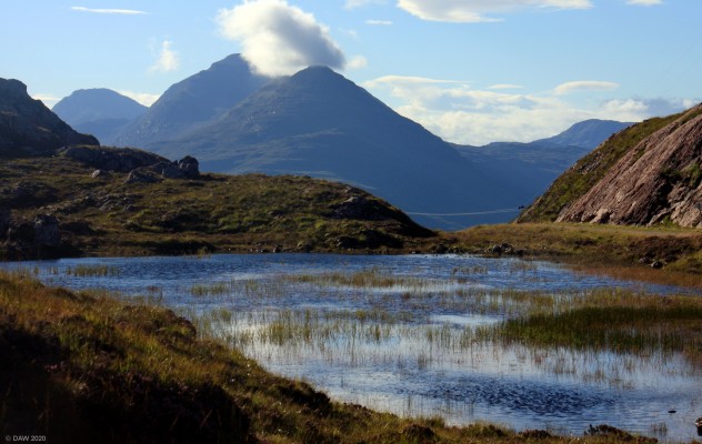 A view of the Damh hills
Looking over towards the Damh hills from a small lochan at the Beallach na Goaithe. [url=https://streetmap.co.uk/map.srf?X=182456&Y=859108&A=Y&Z=115/] Map location. [/url]
