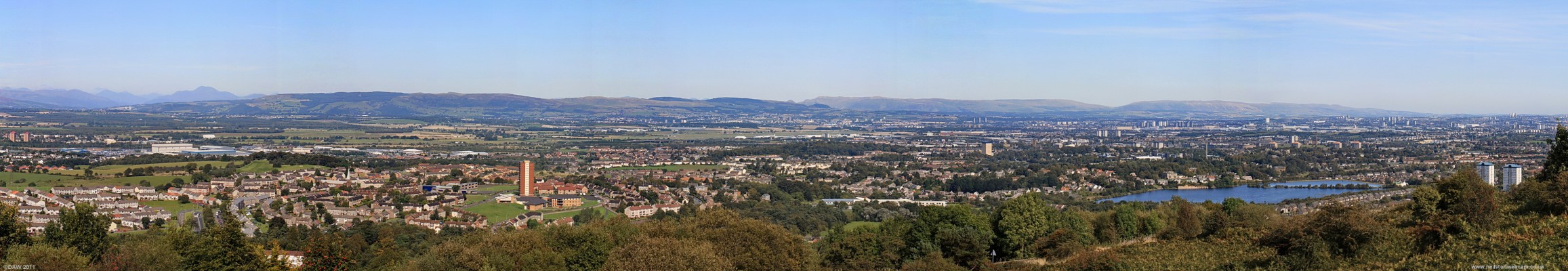 Gleniffer Braes panorama, 2009
Taken in September 2009 with Linwood and Johnston on the left, Foxbar in the middle and the rest of Paisley on the right.  In the distance are the tower blocks of Glasgow.  On the horizon on the left the familiar out line of Ben Lomond can be seen. [url=http://www.streetmap.co.uk/map.srf?X=245531&Y=660494&A=Y&Z=115&ax=245471&ay=660652/] Map location. [/url]
