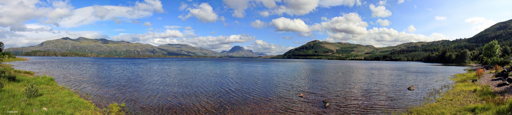 Loch Maree from Slattadale
Panoramic view out across the Loch Maree from Slattadale.  Loch Maree is the largest body of fresh water north of Loch Ness.  In the centre in the distance Slioch rises to some 980m. [url=http://www.streetmap.co.uk/map.srf?X=190275&Y=871165&A=Y&Z=126&ax=188755&ay=871905/] Map location. [/url]
