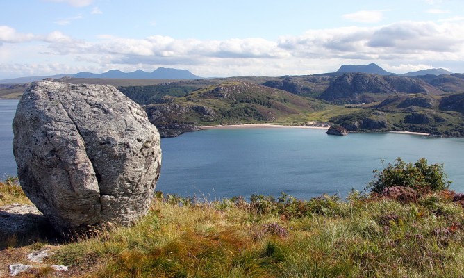 Looking North east from above Little Gruinard
Some of the sandy beaches in Gruinard bay.  The large boulder was probably left by the receading ice at the end of the last ice age.  [url=http://www.streetmap.co.uk/map.srf?X=193977&Y=890242&A=Y&Z=120/] Map location. [/url]
